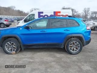 2022 Jeep Cherokee Trailhawk z VIN 1C4PJMBX1ND539319, wystawiony jako IAAI lot #41811178 z przebiegiem 49 922 mil mil oraz . Historia ofert i sprzedaży dostępna na DreamBid. Obrazek 15.