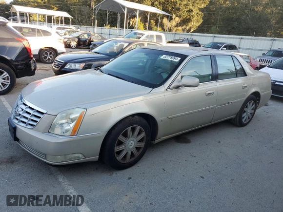 2007 Cadillac DTS V8 z VIN 1G6KD57Y77U125427, wystawiony jako Copart lot #82278094 z przebiegiem 117 812 mil mil oraz Czysty tytuł • Clean title. Historia ofert i sprzedaży dostępna na DreamBid. Obrazek 1.