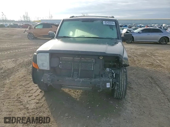 2010 Jeep Commander Limited with VIN 1J4RG5GT6AC113462, listed as a Copart auction lot 82400044 with 189,168 mi miles and Salvage title. Bid and sale history available at DreamBid. Image 12.