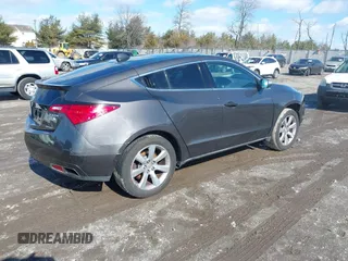 2010 Acura ZDX Tech Pkg with VIN 2HNYB1H44AH501894, listed as a IAAI auction lot 41606969 with 210,308 mi miles. Bid and sale history available at carsss.com. Image 4.
