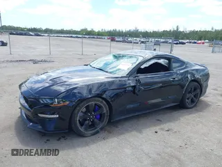 2021 Ford Mustang GT z VIN 1FA6P8CF9M5101993, wystawiony jako IAAI lot #42152731 z przebiegiem 25 699 mil mil oraz . Historia ofert i sprzedaży dostępna na DreamBid. Obrazek 6.