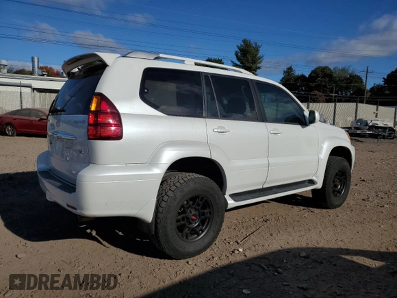 2004 Lexus GX 470 with VIN JTJBT20X440055224, listed as a Copart auction lot 75511534 with 87,324 mi miles and Salvage Title. Bid and sale history available at carsss.com. Image 3.