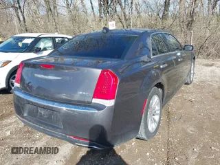 2017 Chrysler 300 with VIN 2C3CCAEG2HH559755, listed as a IAAI auction lot 41854444 with 135,744 mi miles. Bid and sale history available at carsss.com. Image 4.