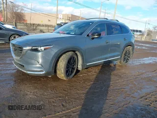 2022 Mazda CX-9 Grand Touring with VIN JM3TCBDYXN0618313, listed as a IAAI auction lot 41452750 with 34,356 mi miles and . Bid and sale history available at DreamBid. Image 17.