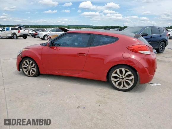 2013 Hyundai Veloster w/Gray Int z VIN KMHTC6AD7DU142655, wystawiony jako Copart lot #56233005 z przebiegiem 181 297 mil mil oraz Czysty tytuł • Clean title. Historia ofert i sprzedaży dostępna na DreamBid. Obrazek 2.