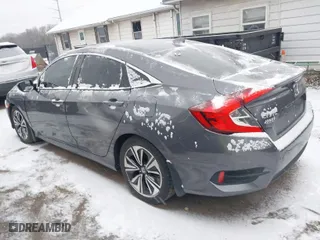 2016 Honda Civic Sedan EX-T with VIN 2HGFC1F33GH640252, listed as a IAAI auction lot 41593876 with 120,307 mi miles. Bid and sale history available at carsss.com. Image 3.