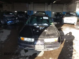 2000 Saturn SL with VIN 1G8ZH5282YZ214070, listed as a IAAI auction lot 41537546 with 94,319 mi miles. Bid and sale history available at carsss.com. Image 6.