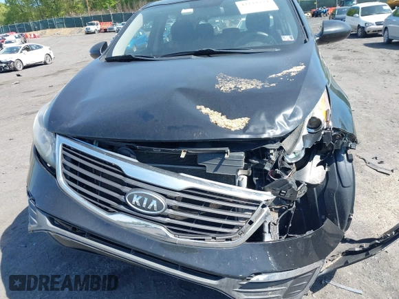2012 Kia Sportage LX with VIN KNDPB3A28C7187185, listed as a IAAI auction lot 42233774 with 223,235 mi miles and . Bid and sale history available at DreamBid. Image 6.