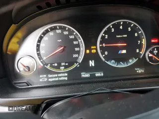 2014 BMW M5 with VIN WBSFV9C5XED593740, listed as a Copart auction lot 45210415 with 76,583 mi miles and Clean Title. Bid and sale history available at carsss.com. Image 9.