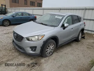 2016 Mazda CX-5 Touring z VIN JM3KE4CY4G0678108, wystawiony jako Copart lot #58466445 z przebiegiem 98 869 mil mil oraz Czysty tytuł • Clean title. Historia ofert i sprzedaży dostępna na DreamBid. Obrazek 1.