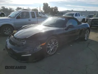 2014 Porsche Boxster with VIN WP0CA2A84ES121667, listed as a Copart auction lot 87510945 with 62,689 mi miles and Salvage Title. Bid and sale history available at carsss.com. Image 1.