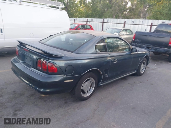 1998 Ford Mustang z VIN 1FAFP4041WF161422, wystawiony jako IAAI lot #42495413 z przebiegiem 207 906 mil mil oraz . Historia ofert i sprzedaży dostępna na DreamBid. Obrazek 4.