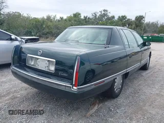 1996 Cadillac DeVille z VIN 1G6KF5298TU269234, wystawiony jako IAAI lot #41345945 z przebiegiem 34 218 mil mil oraz . Historia ofert i sprzedaży dostępna na DreamBid. Obrazek 4.