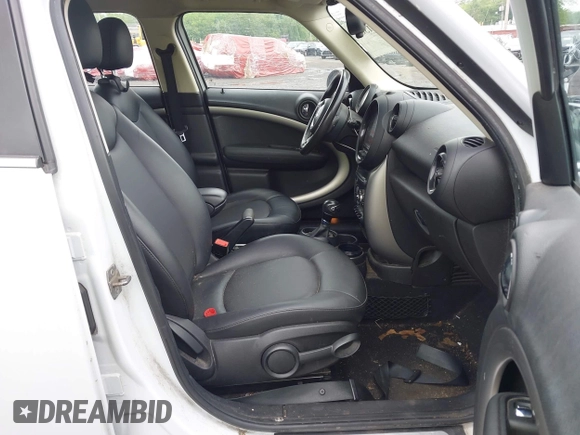 2013 MINI Countryman with VIN WMWZB3C53DWM08244, listed as a IAAI auction lot 42281364 with 139,894 mi miles and . Bid and sale history available at DreamBid. Image 5.