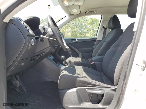 2017 Volkswagen Tiguan S with VIN WVGAV7AX1HK044093, listed as a Copart auction lot 52816015 with 94,610 mi miles and Salvage Title. Bid and sale history available at carsss.com. Image 7.