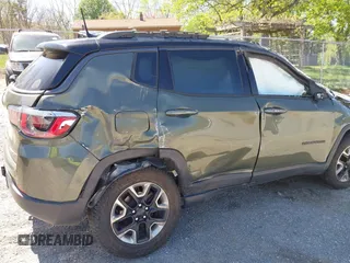 2018 Jeep Compass Trailhawk with VIN 3C4NJDDB0JT241163, listed as a IAAI auction lot 41986193 with 89,246 mi miles and . Bid and sale history available at DreamBid. Image 13.