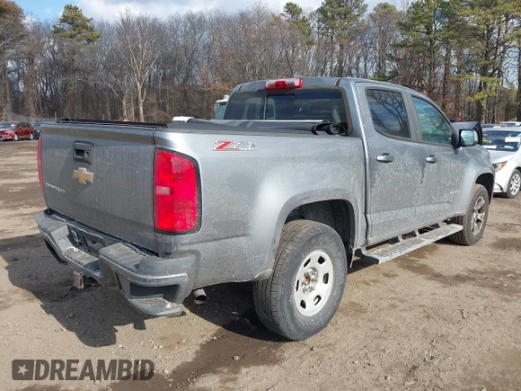 2018 Chevrolet Colorado 4WD Z71 z VIN 1GCGTDENXJ1133572, wystawiony jako IAAI lot #41437941 z przebiegiem 82 254 mil mil oraz . Historia ofert i sprzedaży dostępna na DreamBid. Obrazek 4.