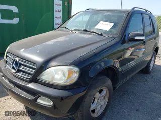 2004 Mercedes-Benz M-Class 3.5L with VIN 4JGAB57E24A468675, listed as a IAAI auction lot 42056078 with 197,169 mi miles. Bid and sale history available at carsss.com. Image 2.