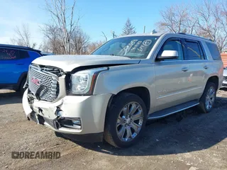 2016 GMC Yukon Denali with VIN 1GKS2CKJ5GR393269, listed as a IAAI auction lot 41963630 with 158,584 mi miles and . Bid and sale history available at DreamBid. Image 17.