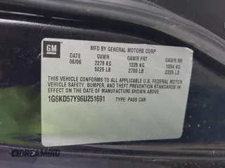 2006 Cadillac DTS w/1SC with VIN 1G6KD57Y96U251691, listed as a IAAI auction lot 41086147 with 128,959 mi miles. Bid and sale history available at carsss.com. Image 9.