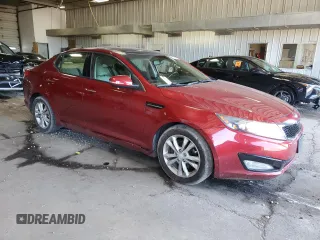 2013 Kia Optima EX z VIN 5XXGN4A79DG110715, wystawiony jako Copart lot #63193895 z przebiegiem 103 120 mil mil oraz Nie do naprawy • Non repairable. Historia ofert i sprzedaży dostępna na DreamBid. Obrazek 4.