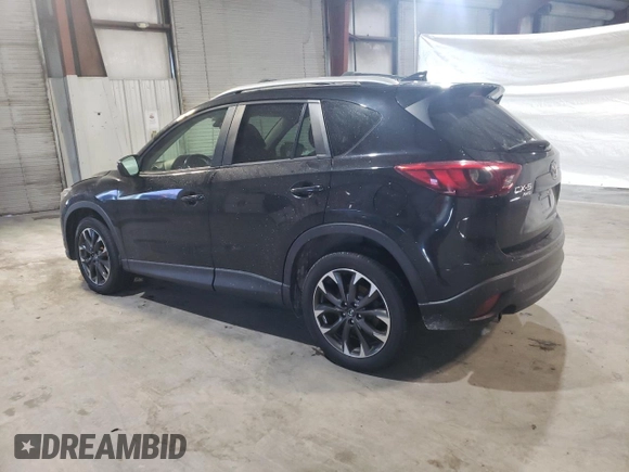 2016 Mazda CX-5 Grand Touring with VIN JM3KE4DY6G0655802, listed as a Copart auction lot 43820475 with 76,639 mi miles and Salvage Title. Bid and sale history available at carsss.com. Image 2.