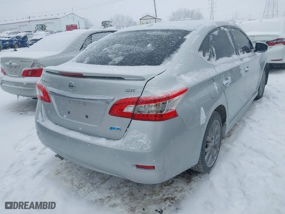 2013 Nissan Sentra SR with VIN 3N1AB7AP0DL609619, listed as a IAAI auction lot 41299588 with 121,661 mi miles. Bid and sale history available at carsss.com. Image 4.