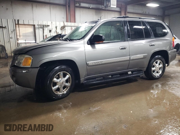 2005 GMC Envoy SLE with VIN 1GKDT13S952334233, listed as a Copart auction lot 85115854 with 221,131 mi miles and Salvage Title. Bid and sale history available at carsss.com. Image 1.