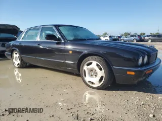 1997 Jaguar XJ with VIN SAJPX1149VC794067, listed as a Copart auction lot 85457044 with 139,764 mi miles and Clean title. Bid and sale history available at DreamBid. Image 4.
