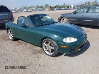 2001 Mazda MX-5 Miata z VIN JM1NB353110214307, wystawiony jako IAAI lot #42407414 z przebiegiem 158 400 mil mil oraz . Historia ofert i sprzedaży dostępna na DreamBid. Obrazek 1.