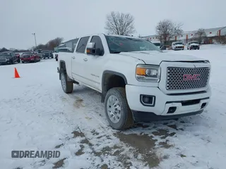 2015 GMC Sierra 2500HD available WiFi Denali with VIN 1GT120E88FF680538, listed as a IAAI auction lot 41571684 with 125,147 mi miles. Bid and sale history available at carsss.com. Image 1.