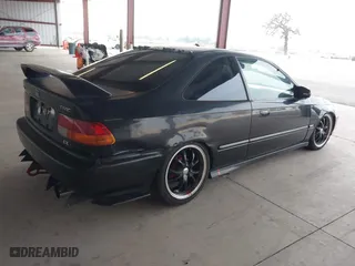 1998 Honda Civic EX with VIN 1HGEJ8246WL081080, listed as a IAAI auction lot 41435439 with 188,999 mi miles. Bid and sale history available at carsss.com. Image 4.