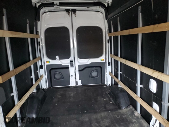 2023 Ford Transit Cargo с VIN 1FTBR1X8XPKB23061, выставлен на аукционе Copart как лот 58814525 с пробегом 24 432 миль миль и Списание • Salvage title. История ставок и продаж доступна на DreamBid. Изображение 10.