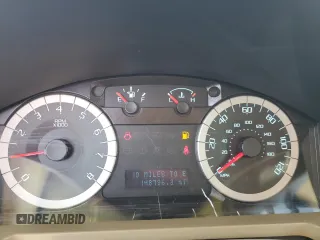 2010 Ford Escape Limited z VIN 1FMCU9EG5AKC49732, wystawiony jako Copart lot #61172415 z przebiegiem 148 796 mil mil oraz Szkoda całkowita • Salvage title. Historia ofert i sprzedaży dostępna na DreamBid. Obrazek 9.