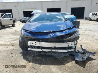 2024 Toyota Prius LE with VIN JTDADABU9R3012478, listed as a Copart auction lot 60652895 with 6,859 mi miles and Salvage title. Bid and sale history available at DreamBid. Image 5.