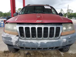 2003 Jeep Grand Cherokee Laredo z VIN 1J4GX48SX3C604630, wystawiony jako IAAI lot #42762013 z przebiegiem 202 563 mil mil oraz . Historia ofert i sprzedaży dostępna na DreamBid. Obrazek 6.