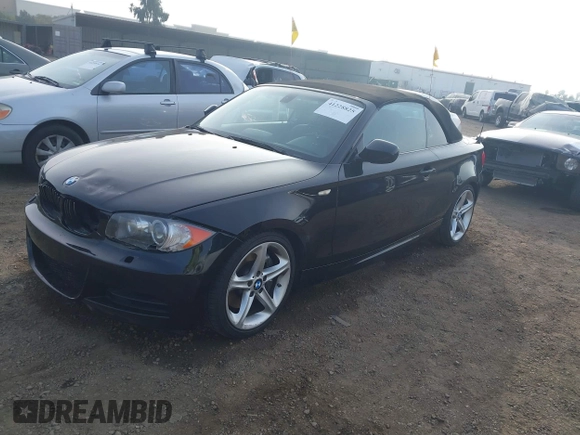 2010 BMW 1 Series 135i with VIN WBAUN9C54AVK41785, listed as a IAAI auction lot 41228825 with 60,817 mi miles and . Bid and sale history available at carsss.com. Image 2.