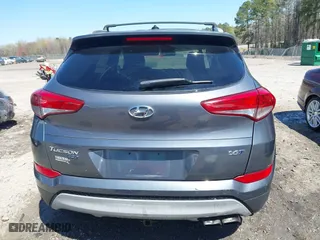 2017 Hyundai Tucson Value with VIN KM8J33A23HU405296, listed as a IAAI auction lot 41887237 with 114,027 mi miles. Bid and sale history available at carsss.com. Image 16.