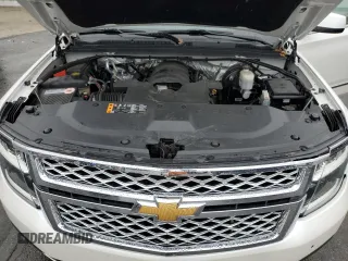 2017 Chevrolet Tahoe LT z VIN 1GNSKBKC5HR306034, wystawiony jako Copart lot #55788245 z przebiegiem 87 726 mil mil oraz Szkoda całkowita • Salvage title. Historia ofert i sprzedaży dostępna na DreamBid. Obrazek 12.