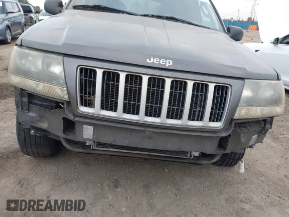 2004 Jeep Grand Cherokee Laredo with VIN 1J4GX48S34C214485, listed as a IAAI auction lot 42208120 with 164,322 mi miles and . Bid and sale history available at DreamBid. Image 6.