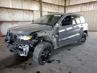 2020 Jeep Grand Cherokee Laredo E with VIN 1C4RJEAGXLC428366, listed as a Copart auction lot 52699605 with 60,738 mi miles and Salvage title. Bid and sale history available at DreamBid. Image 1.