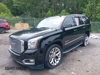 2016 GMC Yukon Denali with VIN 1GKS1CKJXGR254306, listed as a IAAI auction lot 39953539 with 164,149 mi miles. Bid and sale history available at carsss.com. Image 18.