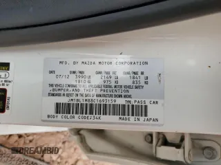 2012 Mazda 3 i Grand Touring with VIN JM1BL1M88C1693159, listed as a Copart auction lot 56068295 with 90,669 mi miles and Salvage title. Bid and sale history available at DreamBid. Image 12.