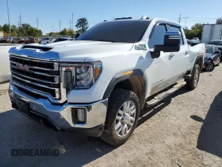 2020 GMC Sierra 2500HD SLT z VIN 1GT49NE77LF102990, wystawiony jako Copart lot #71809853 z przebiegiem 79 550 mil mil oraz Szkoda całkowita • Salvage title. Historia ofert i sprzedaży dostępna na DreamBid. Obrazek 1.
