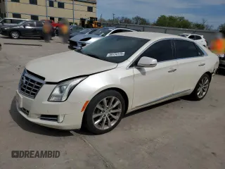 2013 Cadillac XTS Luxury with VIN 2G61R5S31D9100234, listed as a Copart auction lot 50174175 with 98,600 mi miles and Salvage title. Bid and sale history available at DreamBid. Image 1.