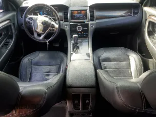 2014 Ford Taurus Limited z VIN 1FAHP2J88EG177883, wystawiony jako Copart lot #56119255 z przebiegiem 141 743 mil mil oraz Szkoda całkowita • Salvage title. Historia ofert i sprzedaży dostępna na DreamBid. Obrazek 8.