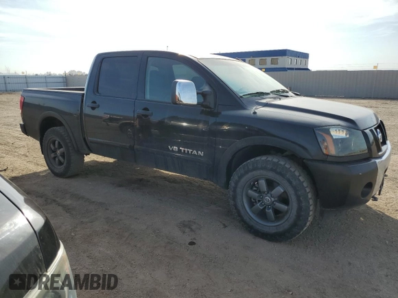 2015 Nissan Titan Pro-4X with VIN 1N6BA0EC9FN507495, listed as a Copart auction lot 49336715 with 95,749 mi miles and Clean title. Bid and sale history available at DreamBid. Image 4.