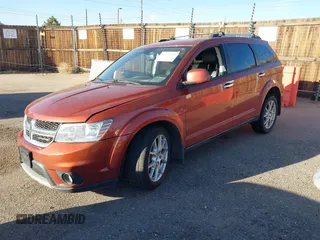 2014 Dodge Journey R/T with VIN 3C4PDDFG4ET104127, listed as a IAAI auction lot 40702930 with 87,058 mi miles and . Bid and sale history available at DreamBid. Image 2.