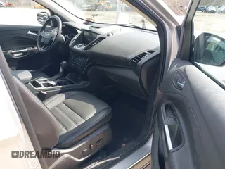 2017 Ford Escape Titanium with VIN 1FMCU9JD3HUE03686, listed as a IAAI auction lot 42016950 with 82,299 mi miles. Bid and sale history available at carsss.com. Image 5.
