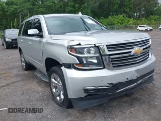 2015 Chevrolet Tahoe LTZ z VIN 1GNSCCKC1FR706608, wystawiony jako IAAI lot #42110988 z przebiegiem 219 901 mil mil oraz . Historia ofert i sprzedaży dostępna na DreamBid. Obrazek 1.